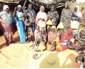 Mothers receive food for their little ones