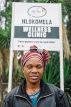 A woman going to Hlokomela Clinic to receive pads