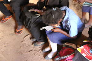 Girl writing during class