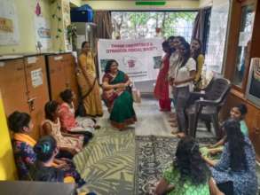 Doctor addressing the girls during the session