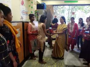 Menstrual hygiene kit being distributed