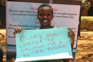 Girl showcasing a message after school outreach.