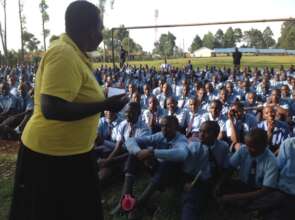 Gladys discussing with students the effects of FGM