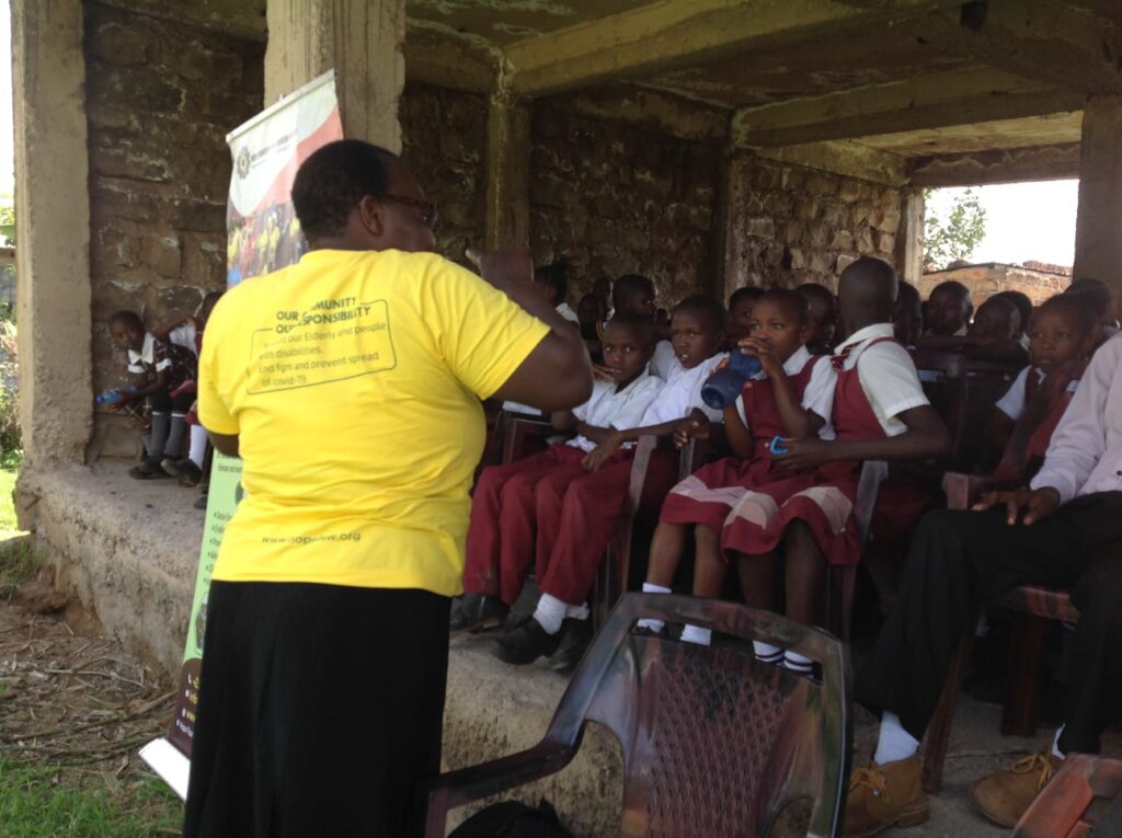 Gladys explain the health impact of FGM to pupils