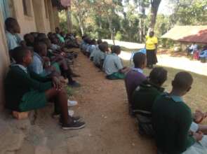 HFAW staff interacting with pupils.