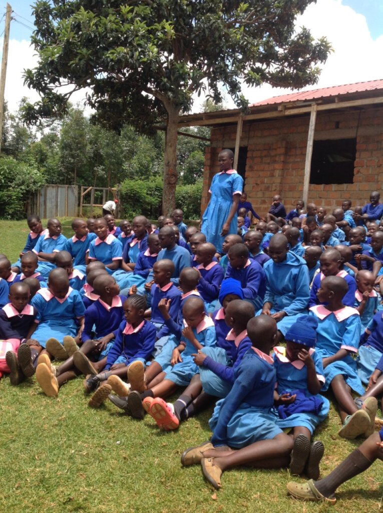 Loic explaining how she will share FGM information