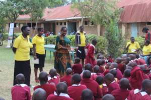 Mothers during a girls' mentorship session