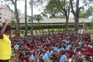 Miss Leah, the acting CEO, addressing the students