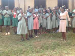 Madam Jane welcomin HFAW to Nyamakairo primary