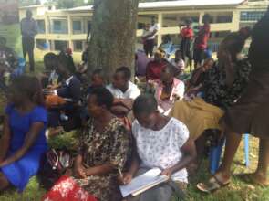 Teen mothers follow the session attentively