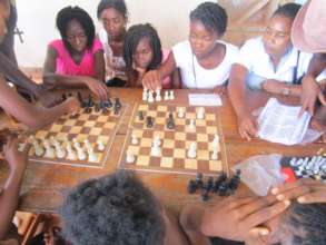 Girls' Club members playing chess.