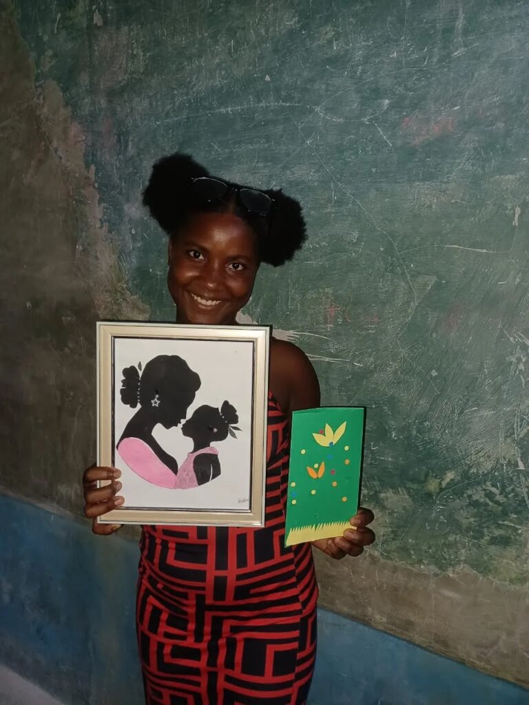 Silhouette art workshop participant and her art.