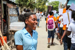 Community activists organize a march to end VAWG.