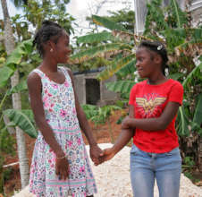 Stephanie (L) and Claire are girls' club members.