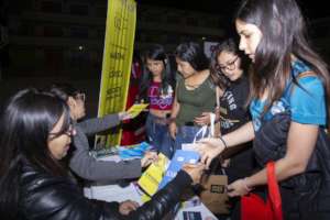Girls receiving information from a university