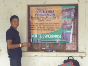 Hanging the sign in front of the Eco-Store