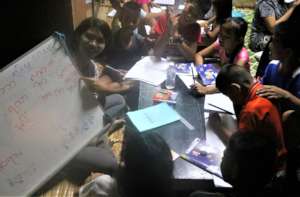 Su Myat working with her Shan students