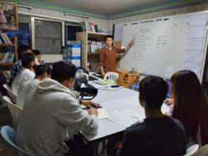 Chen at work teaching Thai to Burmese speakers