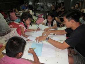 Awn Khay teaching in a construction camp