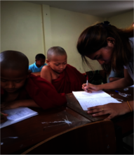 Su checking students' exercises at temple