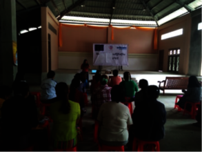 Su Myat assisting with gender issue workshops.