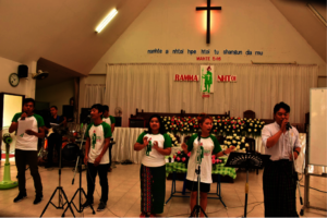 Weh singing song during WCC Church service