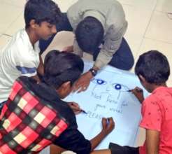 Participants draw "It's not okay" messages for BMG