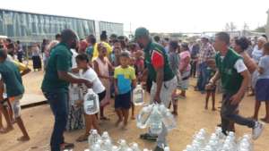 Crowds Wait Patiently for Water