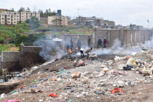 The dumpsite. They burn rubbish on a regular basis