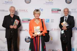 We (in the middle) receive the award in Paris