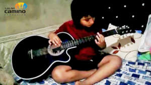 Daniel playing guitar