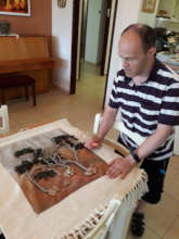 Kobi (blind) ready to present tree of life artwork