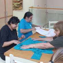 Folding, sorting, stacking, selling workshop