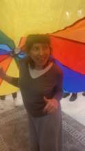 Ayala enjoying a rainbow kite activity