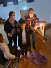 Lighting chanukah candles