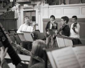 First violins in rehearsal