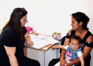 Happy Anna and her mother at their consultation