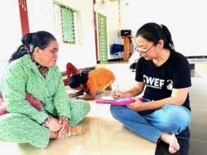 CWEF Director in Cambodia interviewing a villager