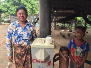 Solang with her BioSand Water Filter