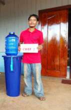 Kanyo with the Biosand Water Filter You Gave Him