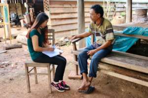 CWEF volunteer visits with local recipient