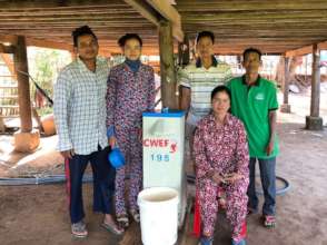 Sambo and Ku, with local pastor and volunteers