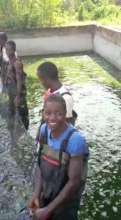 School youth enjoying catching fish