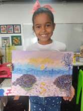 Sofia with her painting of Cezanne