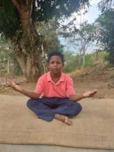 Juan, 8, doing his Yoga class
