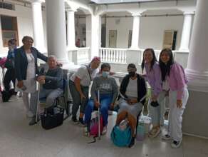 Giving the bracelets to the patients