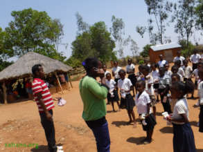 Teacher handing our masks