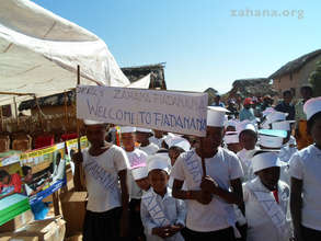 Children welcoming the visitors