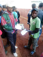 Papers in hand waiting for the exam to start
