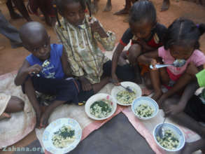 Students eating noodles with Moringa